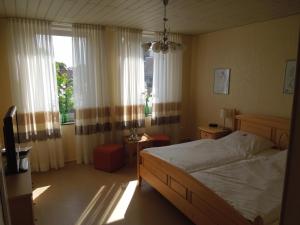Posteľ alebo postele v izbe v ubytovaní Haus Bergmann