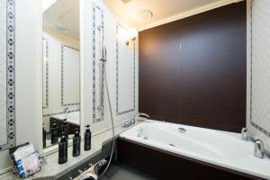 Ванная комната в Hotel Concerto Nagasaki