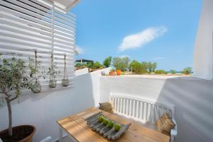 Balkón nebo terasa v ubytování Vamare Beachfront House