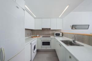 Kuchyň nebo kuchyňský kout v ubytování Vamare Beachfront House + 10 fotografií