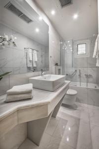 Koupelna v ubytování Rex Hotel