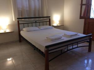 Een bed of bedden in een kamer bij Panorama Thea