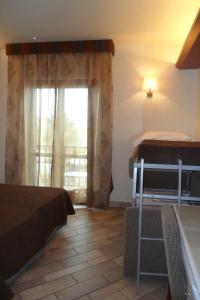 Postel nebo postele na pokoji v ubytování Hotel Eden