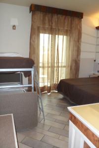 Postel nebo postele na pokoji v ubytování Hotel Eden