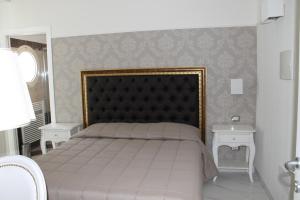 Postel nebo postele na pokoji v ubytování Hotel Residence Villa Del Mare