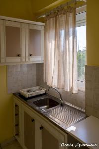 Fotografie z fotogalerie ubytování Drosia Apartments v destinaci Kypseli + 37 fotografií