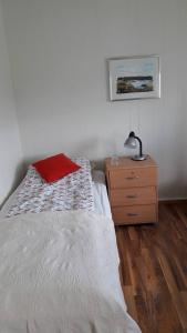 Łóżko lub łóżka w pokoju w obiekcie Glæsibær