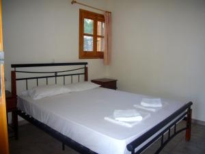 Een bed of bedden in een kamer bij Panorama Thea