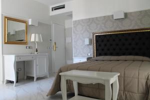 Postel nebo postele na pokoji v ubytování Hotel Residence Villa Del Mare