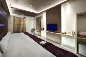 TV o dispositivi per l'intrattenimento presso One Fukun Hotel