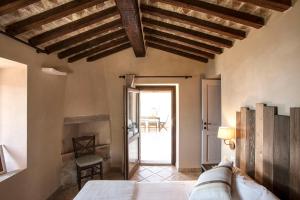 Postel nebo postele na pokoji v ubytování Agriturismo Galenzana