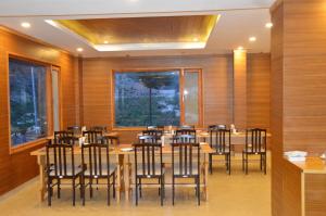 En restaurant eller et spisested på Hotel Batseri SANGLA