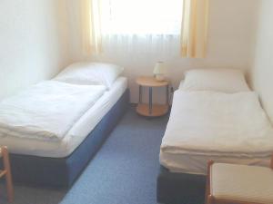 Postel nebo postele na pokoji v ubytování Gasthof zur Krone