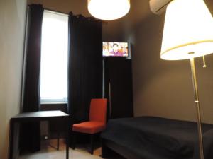 Een bed of bedden in een kamer bij Corridoni Suites