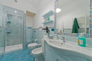 Phòng tắm tại La Mela Blu