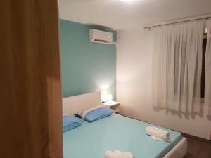 Cama ou camas em um quarto em Guest House Sombrero