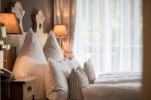 Letto o letti in una camera di Chalet Hotel Hartmann - Adults Only