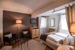 Letto o letti in una camera di Chalet Hotel Hartmann - Adults Only