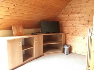 Televízia a/alebo spoločenská miestnosť v ubytovaní J&M privat