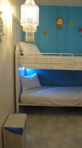 Posteľ alebo postele v izbe v ubytovaní Rhodes Backpackers Boutique Hostel and Apartments