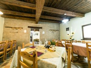 a dining room with a table and chairs at Agriturismo Fonte Carella in Monte San Pietrangeli