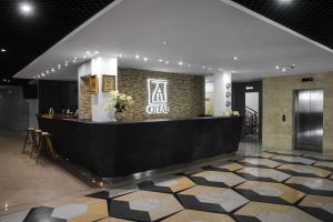 a lobby of a hotel with a reception desk at Ya - Hotel in Kostroma