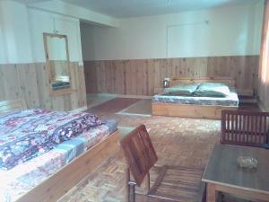 Postel nebo postele na pokoji v ubytování Hotel Yak Jispa