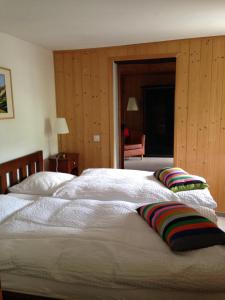 Postel nebo postele na pokoji v ubytování Hotel de la Sage
