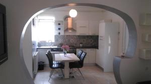 Kuchyň nebo kuchyňský kout v ubytování Apartment "Kiki"