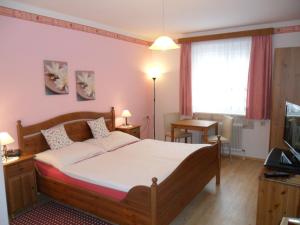 Postel nebo postele na pokoji v ubytování Pension Hendling