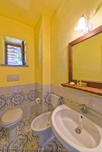 Koupelna v ubytování Agriturismo Pera Di Basso