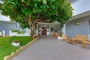 Ein Garten an der Unterkunft Hotel Villa Rita