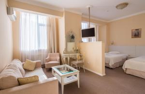Postel nebo postele na pokoji v ubytování light hotel & hub
