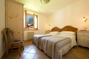 Postel nebo postele na pokoji v ubytování Residence Rio Piccolo