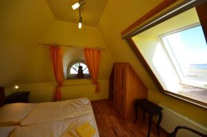 Postel nebo postele na pokoji v ubytování Reet Hausteile Sonnenkliff und Kamp