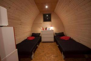a room with two beds and a dresser at Solmeco Park in Aldeia do Meco +43 photos