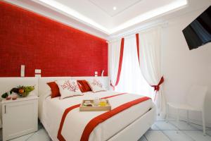 Postel nebo postele na pokoji v ubytování B&B Maiori Luxury