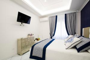 Postel nebo postele na pokoji v ubytování B&B Maiori Luxury