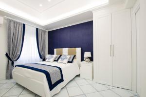 Postel nebo postele na pokoji v ubytování B&B Maiori Luxury