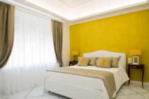 Postel nebo postele na pokoji v ubytování B&B Maiori Luxury