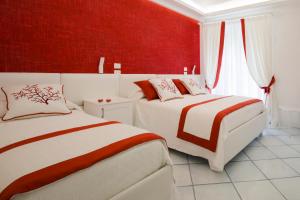 Postel nebo postele na pokoji v ubytování B&B Maiori Luxury