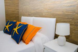 Postel nebo postele na pokoji v ubytování B&B Maiori Luxury