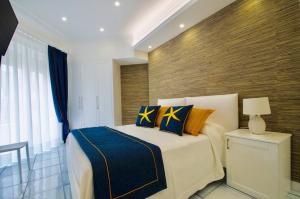 Postel nebo postele na pokoji v ubytování B&B Maiori Luxury