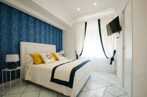 Postel nebo postele na pokoji v ubytování B&B Maiori Luxury