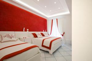Postel nebo postele na pokoji v ubytování B&B Maiori Luxury