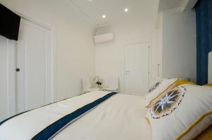 Postel nebo postele na pokoji v ubytování B&B Maiori Luxury