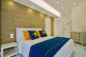 A bed or beds in a room at B&B Maiori Luxury