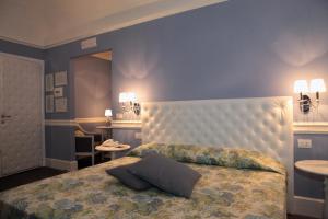 Letto o letti in una camera di Hotel Il Barocco
