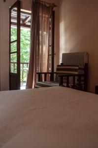 Katil atau katil-katil dalam bilik di Christofer's Rooms