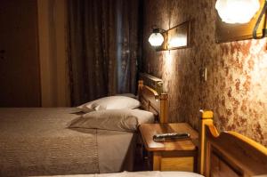 Posteľ alebo postele v izbe v ubytovaní Christofer's Rooms + 37 fotografií